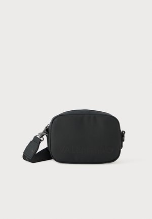 Black nylon crossbody bag with a rectangular shape, featuring a textured front, signature logo, adjustable strap, and metal hardware.