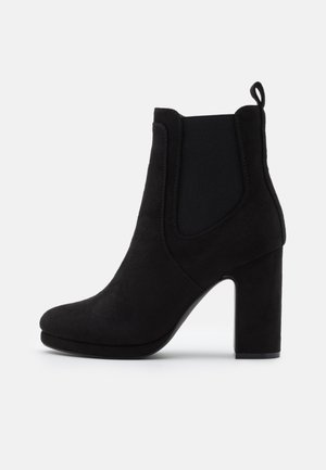 Bottines à talons hauts - black