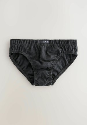 Schwarze Baumwollslips mit einem elastischen Bund, versehen mit gekräuselten Nähten an den Seiten und einer glatten Oberfläche. Markenlabel auf dem Bund sichtbar.