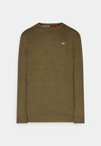 Oliivinvihreä neulottu pusero pyöreällä kaula-aukolla. Resorireunukset hihansuissa ja helmassa. Edessä pieni logo, jossa punaiset ja siniset yksityiskohdat.