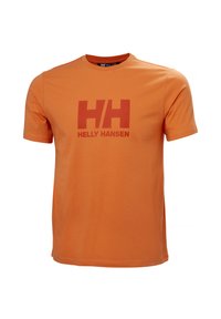 Oranžové bavlněné tričko s kulatým výstřihem, krátkými rukávy a velkým červeným logem "HH" s textem "HELLY HANSEN" umístěným uprostřed dole.