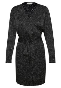 Vestido negro en tejido de satén, con mangas largas, cinturilla anudada y un patrón de lunares blancos en toda la prenda. Textura suave con escote en V.