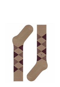 Calze beige con un motivo a rombi in tonalità di marrone e bordeaux, con accenti rosa chiaro. Una calza è rivolta per mostrare la suola.