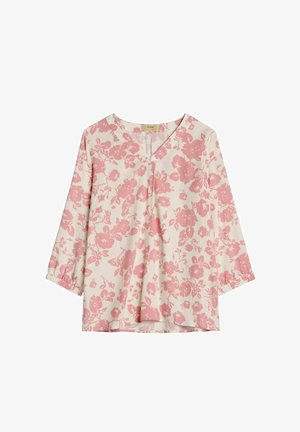 Kremowa bluzka z długimi rękawami i różowym kwiatowym wzorem, z dekoltem w serek i delikatnym plisowaniem na środku przodu.