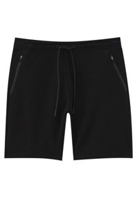 Shorts de sport noirs en tissu texturé, dotés d'une ceinture avec cordon de serrage et de deux fermetures éclair sur les poches avant.
