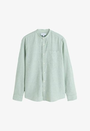 Világoszöld gombos ing mandzsettagallérral, egyetlen mellzsebbel és kockás mintával. Puha anyagból készült, fehér gombokkal.