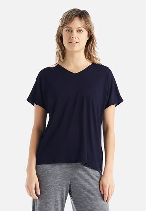 Marinblå V-hals t-shirt i ett mjukt, lätt tyg. Kort ärm, avslappnad passform och sömlös design kompletterar vardagskläder.