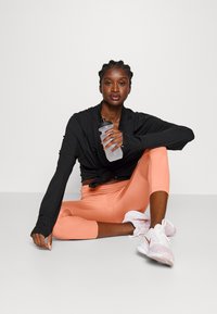 Nike Performance FAST CROP - Leggings - madder root/silver