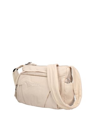 Sac bandoulière beige avec sangle réglable, poche avant zippée et logo GMV brodé sur une surface en tissu lisse.