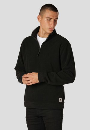 Tröja med dragkedja - black