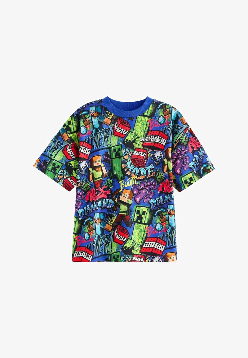 T-shirt med korte ærmer med et farverigt Minecraft grafikprint, primært grøn, blå og rød, med forskellige figurer og mønstre.