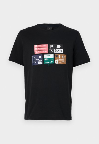 Black cotton t-shirt featuring various travel signage graphics in multiple colors, including city names and distance indicators.