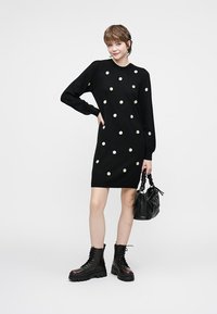 Object OBJTHESS - Strikkjoler - black/sandshell