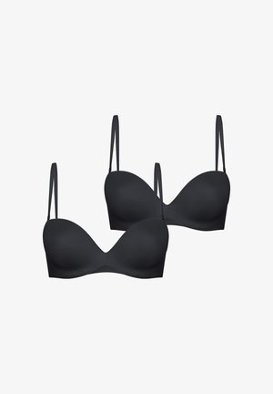Dos sujetadores negros, sin costuras, ligeramente acolchados, con tirantes delgados ajustables sobre fondo blanco.