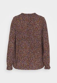 Blusa a maniche lunghe di colore viola scuro con un motivo floreale caratterizzato da fiori rossi, gialli e bianchi. Tessuto morbido con scollatura e polsini arricciati.