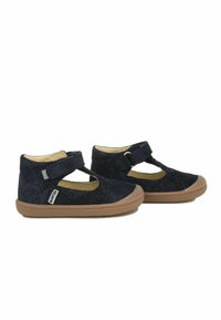 Chaussures pour enfants bleu marine avec une finition pailletée, design découpé, bande Velcro et semelle en caoutchouc marron contrastante.
