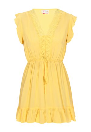 Rumena kratka obleka s kratkimi rokavi in V-izrezom, z čipkastim detajlom okoli izreza, elastičnim pasom in volanastim robom. Narejena iz lahkotnega materiala.