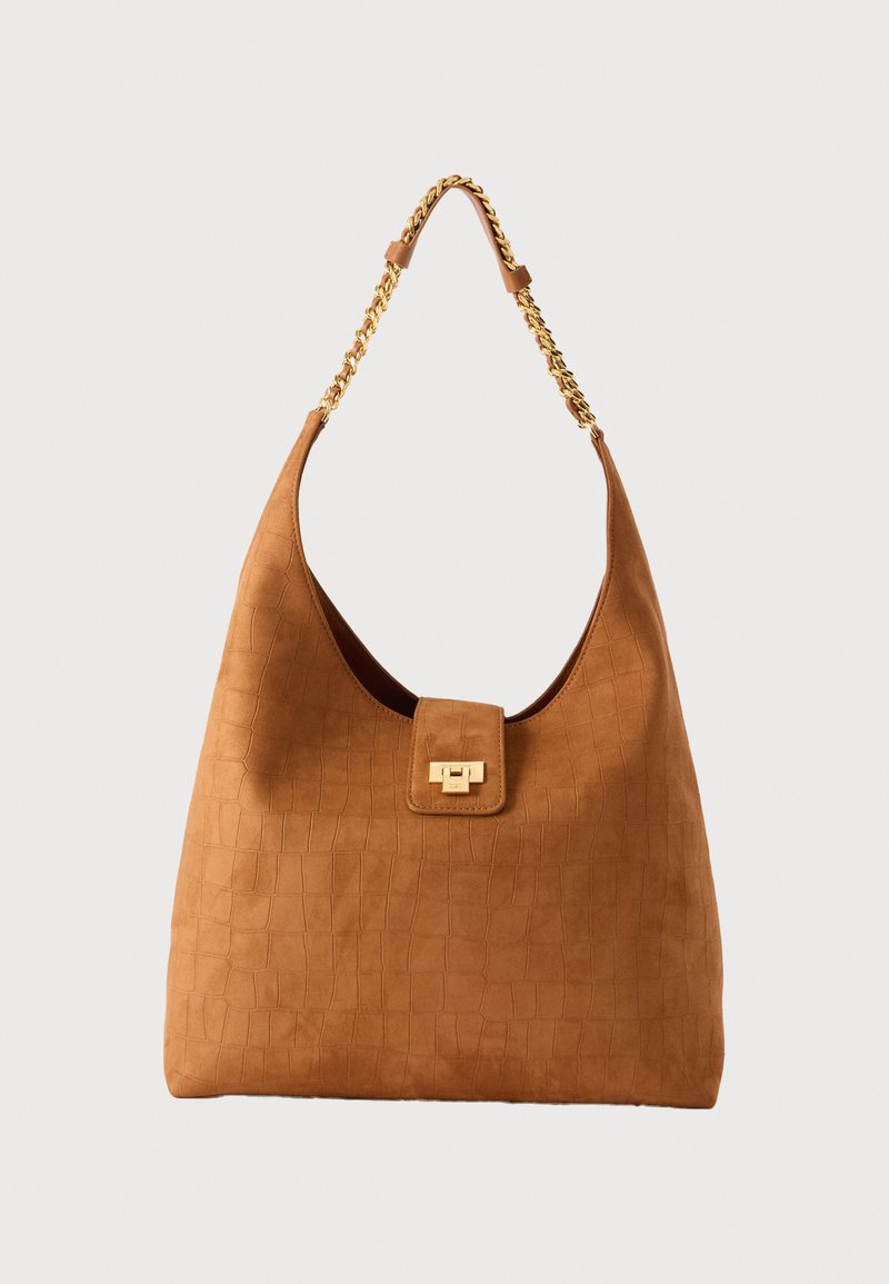 Καφέ τσάντα από σουέντ με μοτίβο κροκόδειλου, λουρί αλυσίδας σε χρυσό τόνο και ορθογώνιο κούμπωμα κλειδώματος σε χρυσό χρώμα.