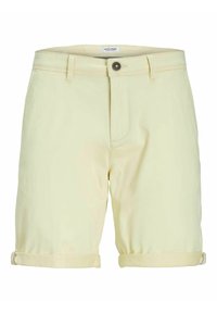 Svetle žluté bavlněné šortky s knoflíkovým zapínáním, ohrnutými nohavicemi a předními kapsami. Hladká textura a upravený design.