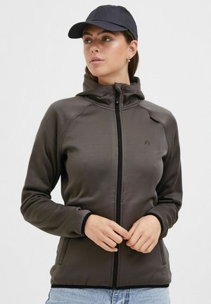 Veste zippée à capuche gris foncé, fabriquée en matériau lisse. Elle présente des poches zippées et un passepoil noir le long des poignets et de l'ourlet.