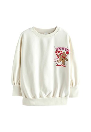 White sweatshirt with a round neckline and balloon sleeves. Features a festive gingerbread man and candy cane graphic in pink and brown.
