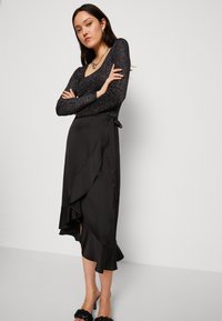 VILA VIELLETTE HW SU-EV - A-silueta svārki - black