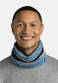 Multicolored neck gaiter in shades of blue, grey, and dark blue, made of soft, textured fabric with a logo tag. Worn loosely around the neck.