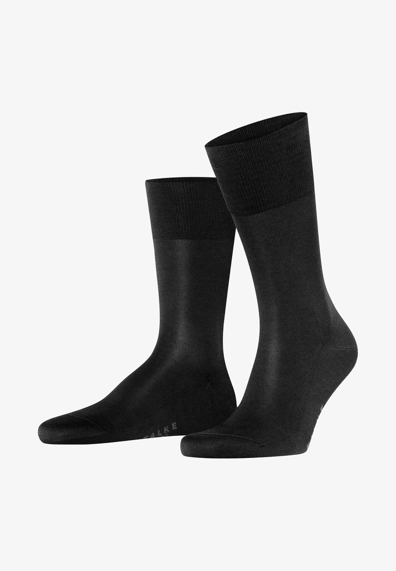 Black socks made of smooth fabric, featuring a reinforced toe and heel, with a ribbed cuff for comfort and a sleek, seamless design.