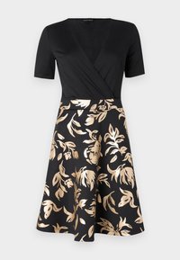 Svart klänning med korta ärmar, ombonad livstycke och utsvängd kjol med ett gyllene blommönster. Mjuk textur och elegant design.