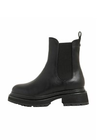 Botas de tobillo de cuero negro con paneles elásticos en los lados, tirador, suela de goma gruesa y costuras detalladas alrededor de la base.