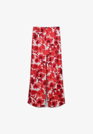 Pantalons larges à motif floral présentant un motif rouge et blanc vibrant. Fabriqués dans un tissu léger avec une texture lisse et une coupe ample.