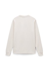 Lichtbeige langemouwen shirt van zachte katoen, met een ronde hals, rechte zoom en een relaxte fit zonder zichtbare logo's of versieringen.