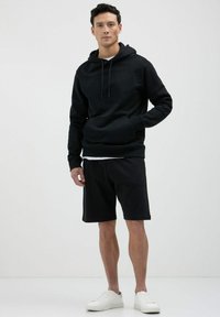 Calliope GINNICO - Pantalon de survêtement - nero
