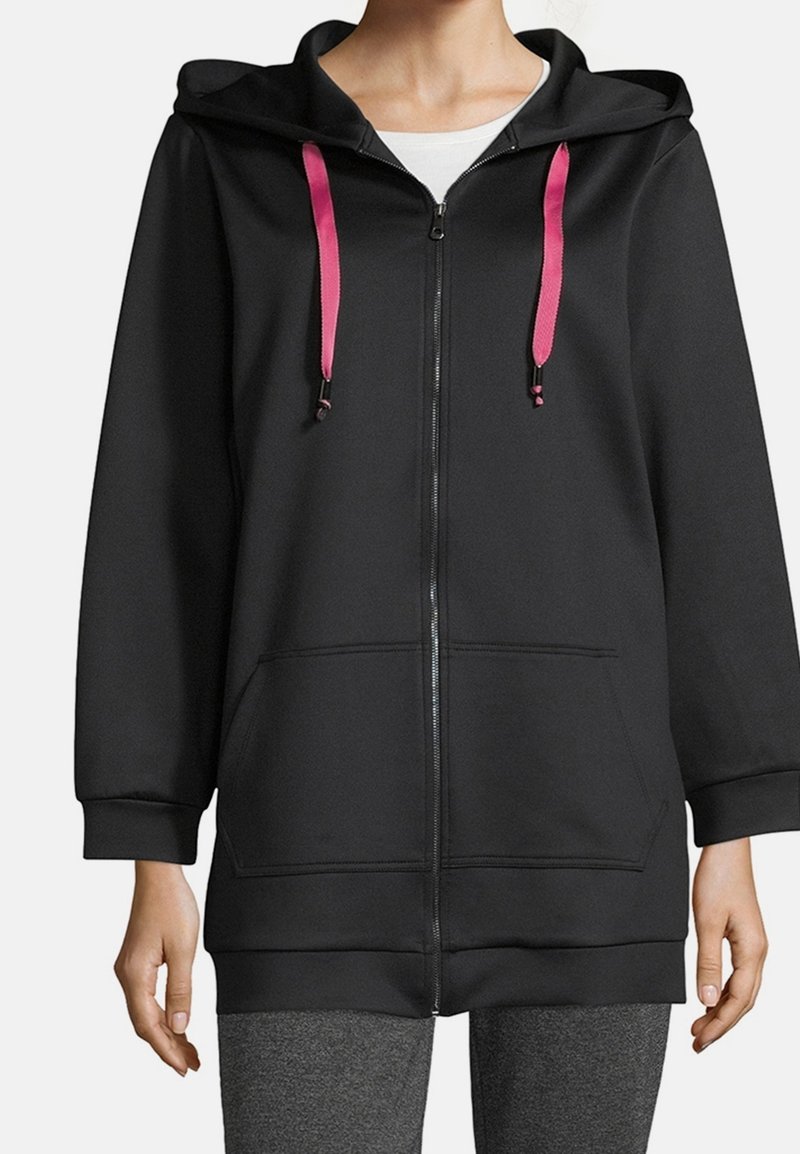 Haut à capuche noir zippé avec des cordons de serrage roses contrastants, poches avant et coupe décontractée. Fabriqué en tissu doux et texturé.