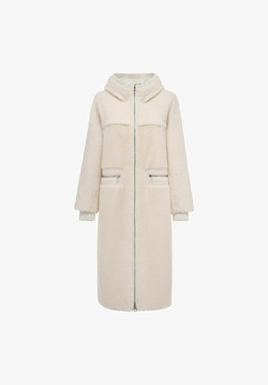 Płaszcz długi z polaru w jasnym beżu. Posiada zamek z przodu, kaptur, dwie przednie kieszenie oraz ściągacze przy mankietach. Miękka tekstura z przytulnym wykończeniem.