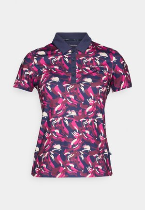 Short-sleeve polo shirt featuring a vibrant abstract pattern in pink, navy, and cream, with a navy collar and three-button placket.