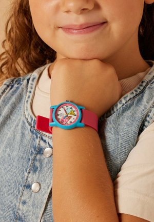 Colorful children’s watch with a pink silicone strap, blue plastic bezel, and a playful ice cream design on the clock face.