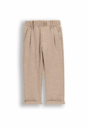 Beżowe dziecięce spodnie z guzikami i elastycznym paskiem w talii, kieszeniami po bokach i mankietami na nogawkach na białym tle.