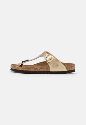 Birkenstock GIZEH NARROW - T veida siksniņu sandales - gold