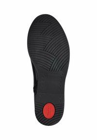 Black shoe sole with textured grip pattern, featuring a red circular accent labeled "Tuning's Comfort," and a size marker "37."