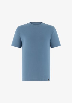 T-shirt bleu uni à manches courtes avec col rond et petite étiquette noire en bas sur un fond blanc.