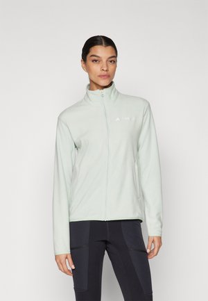 Light green fleece jacket with a high collar, zip front, and side pockets. Features white logo on the left chest. Soft texture.