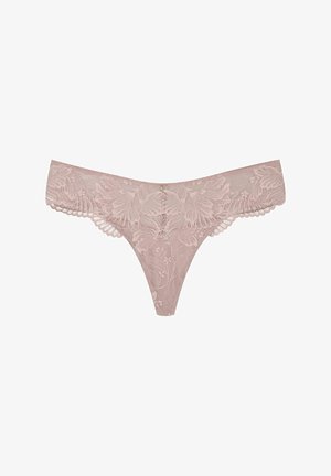 Lace thong in soft pink with floral pattern, scalloped edges, and a small decorative hardware accent at the front center.
