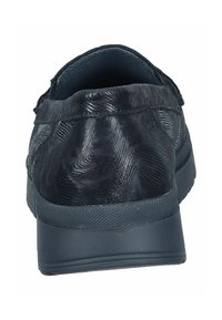 Schwarzer Sneaker mit einem strukturierten Muster, runder Zehenpartie und dämpfender Sohle. Verfügt über ein tief geschnittenes Design und eine glatte, matte Oberfläche.