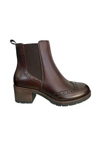 Stivaletto in pelle marrone con pannelli laterali elasticizzati, dettagli brogue, punta arrotondata e un solido tacco a blocco. Suola in gomma testurizzata.