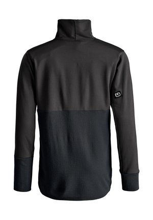 Black pullover with a high collar, featuring a textured lower section, smooth upper section, and a logo detail on the sleeve.