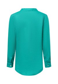 Teal langslavige shirt met een gekraagde halslijn, gladde textuur en knoopmanchetten, met een gebogen zoom aan de achterkant.