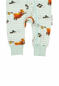 Lyseblå bomulds overalls med gårdstema prints af køer og fugle, med en frontlynlås og ribbede manchetter.