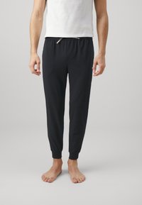 BOSS - UNIQUE PANTS CUFF - Pyjamahousut/-shortsit - black Pienoiskuva 1