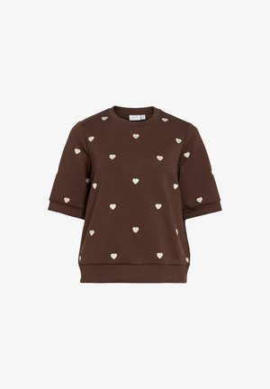 Sweat-shirt marron à manches courtes avec de petits motifs en forme de cœur blanc répartis uniformément sur le tissu.